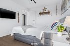  Ferienwohnung Hafenmelodie, App. 14 Olpenitz Ostseeresort Olpenitz - Schlafzimmer