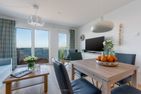  Ferienwohnung Marinablick, App. 20 Olpenitz Ostseeresort Olpenitz - Wohnzimmer