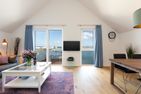  Ferienwohnung Mehrblick, App. 28 Olpenitz Ostseeresort Olpenitz - Wohnzimmer