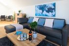  Ferienwohnung Hafenwelt, App. 30 Olpenitz Ostseeresort Olpenitz - Wohnzimmer