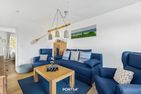  Ferienhaus Captainslodge Olpenitz Ostseeresort Olpenitz - Wohnzimmer