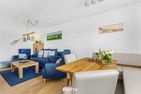  Ferienhaus Captainslodge Olpenitz Ostseeresort Olpenitz - Wohnzimmer
