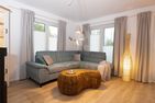  Ferienwohnung Pequeno Secreto Olpenitz Ostseeresort Olpenitz - Wohnzimmer