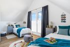  Ferienhaus Nordseeresort32 Nordic Lodge Büsum Büsum - Schlafzimmer