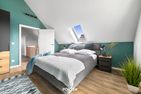 Ferienhaus Nordseeresort55 Meerglück Büsum Büsum - Schlafzimmer