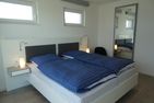  Ferienwohnung Brandung Olpenitz Ostseeresort Olpenitz - Schlafzimmer