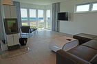  Ferienwohnung Brandung Olpenitz Ostseeresort Olpenitz - Wohnzimmer