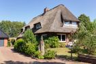  Iris neu - Reetdachhaus Petersen Nebel - 