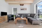  Ferienhaus Nordseeresort53 Storchennest Büsum Büsum - Wohnzimmer