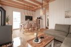  Ferienhaus Schnusel Huus Olpenitz Ostseeresort Olpenitz - Wohnzimmer