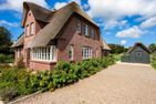  Haus an der Koppel Borgsum - Fassade / Eingang