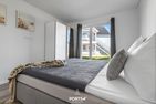  Ferienwohnung Sonnenchalet Olpenitz Ostseeresort Olpenitz - Schlafzimmer