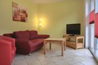  Ferienwohnung KWi 52 OG Graal-Müritz Küstenwald - Wohnzimmer