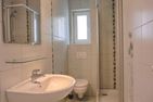  Ferienwohnung KWE 19EG Graal-Müritz Küstenwald - Badezimmer