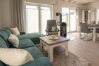  Ferienhaus Nordseeresort50 Havets Lyd Büsum Büsum - Wohnzimmer
