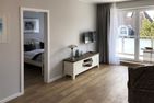  Ferienwohnung Tidenblick Wittdün auf Amrum - Wohnzimmer der Ferienwohnung Tidenblick in Wittdün auf Amrum