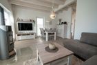  Ferienhaus Nordseeresort47 Dünenglück Büsum Büsum - Wohnzimmer