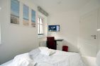  Strandstraße 18c, Whg. 7, Haus Paul Wyk - Schlafzimmer 2 TV