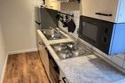  Ferienwohnung Lüttje Delftkieker Ostfriesland - Küche / Küchenzeile