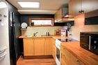  (1) Graues Sommerhaus in Schweden am See mit Boot Smaland - 