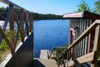  (1) Graues Sommerhaus in Schweden am See mit Boot Smaland - 