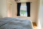  (1) Graues Sommerhaus in Schweden am See mit Boot Smaland - 