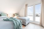  Ferienhaus Nordseeresort52 Sieben Watt Büsum Büsum - Schlafzimmer