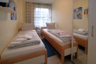  Gmelinstraße 28, Whg. 52, Feriendomizil am Südstrand Wyk - Schlafzimmer mit 2 Einzelbetten