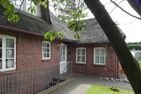 Hüs Sanskiin Ferienwohnung *Goodshenk* Süddorf auf Amrum - Fassade / Eingang