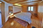 Ferienwohnung HO-24 Hohliebestrasse 24 Lenk im Simmental - Schlafzimmer