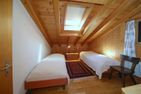 Ferienwohnung HO-24 Hohliebestrasse 24 Lenk im Simmental - Schlafzimmer