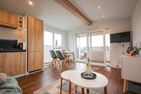  Ferienhaus Ostseechalet Kompass Gelting Geltinger Bucht - Wohnzimmer
