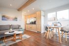  Ferienhaus Ostseechalet Kompass Gelting Geltinger Bucht - Wohnzimmer