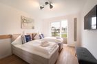  Ferienwohnung Heimathafen Schlei Olpenitz Ostseeresort Olpenitz - Schlafzimmer