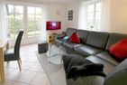 Waldstraße 6c, Haus Halligflieder Wyk - Sitzecke mit Smart/TV