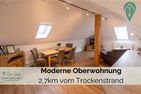  Ferienwohnung Behle Krummhörn - Wohnzimmer