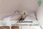  Ferienwohnung Behle Krummhörn - Schlafzimmer
