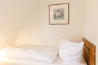  Iris neu - Reetdachhaus Petersen Nebel - 