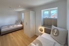 Haus Dünenperle Ferienwohnung "Dünengras" Wittdün auf Amrum - Schlafzimmer