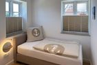 Haus Dünenperle Ferienwohnung "Dünengras" Wittdün auf Amrum - Schlafzimmer