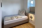 Haus Dünenperle Ferienwohnung "Dünengras" Wittdün auf Amrum - Schlafzimmer