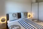 Haus Dünenperle Ferienwohnung "Dünengras" Wittdün auf Amrum - Schlafzimmer