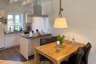Haus Dünenperle Ferienwohnung "Wanderdüne" Wittdün auf Amrum - Küche / Küchenzeile
