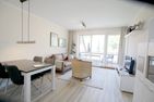  Sandwall 68, Whg. 12, Haus Seeadler Wyk - Wohnzimmer mit Blick zum Balkon