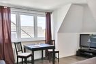 Ferienhaus Ragna Ferienhaus Ragna Appartement 2 Haffkrug - Wohnzimmer