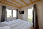  Ferienhaus Skipper Galerie Olpenitz Ostseeresort Olpenitz - Schlafzimmer