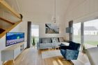  Ferienhaus Skipper Galerie Olpenitz Ostseeresort Olpenitz - Wohnzimmer