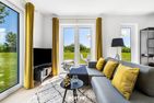 Ferienwohnung Captain Barbossa Olpenitz Ostseeresort Olpenitz - Wohnzimmer