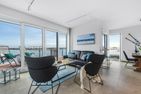  Ferienwohnung Dock 76 Bridge - Penthouse Ostseeresort Olpenitz - Wohnzimmer