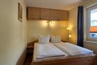  Ferienwohnung KWE 17EG Graal-Müritz Küstenwald - Schlafzimmer